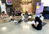 Youth holds protest outside restaurants against use of unsustainable packaging, practices
