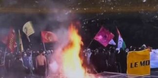 Thousands of protesters march in Geneva against the G7 ahead of the summit in France
